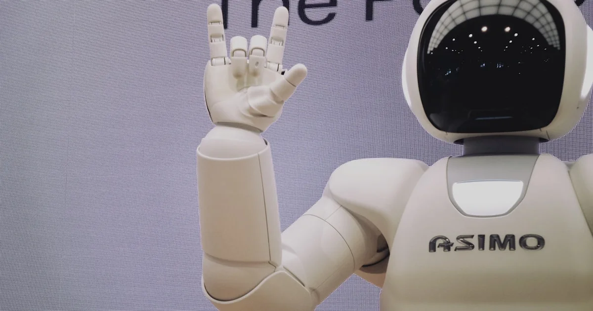 Small business owner reviewing AI marketing dashboard on laptop